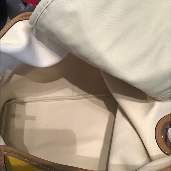 Like new Coach tote bag, beautiful deep yellow color with brown leather. - Picture 2 of 3